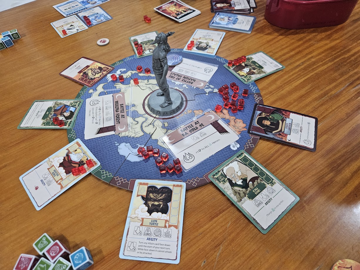 Gameplay photo of the board game Avatar: The Last Airbender – Fire Nation Rising featuring various components and board state.