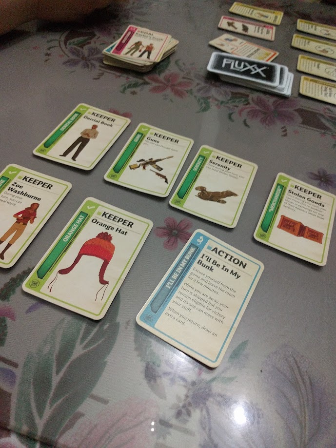 Gameplay photo of the board game Firefly Fluxx featuring various components and board state.