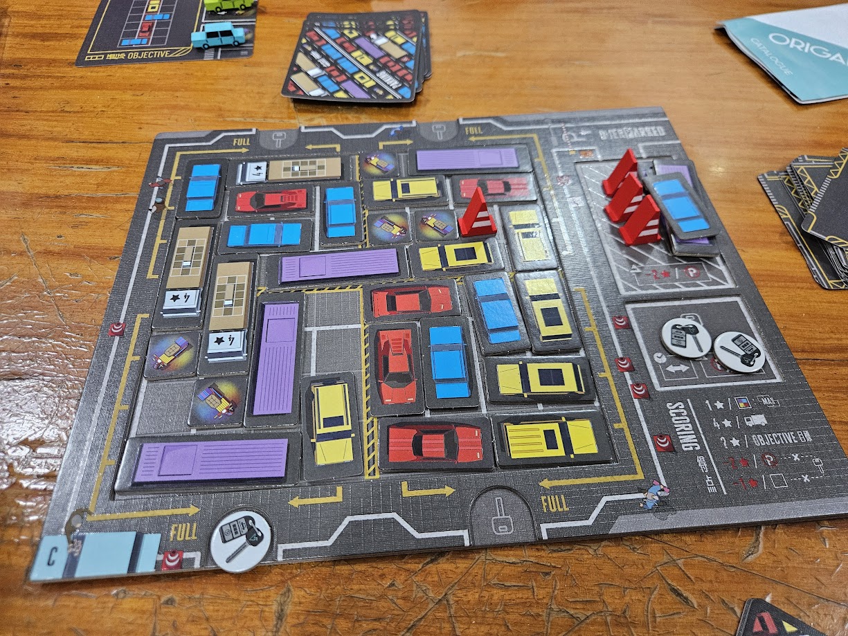 Gameplay photo of the board game Overparked featuring various components and board state.