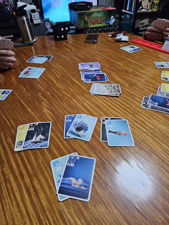Gameplay photo of the board game Sea Salt & Paper featuring various components and board state.