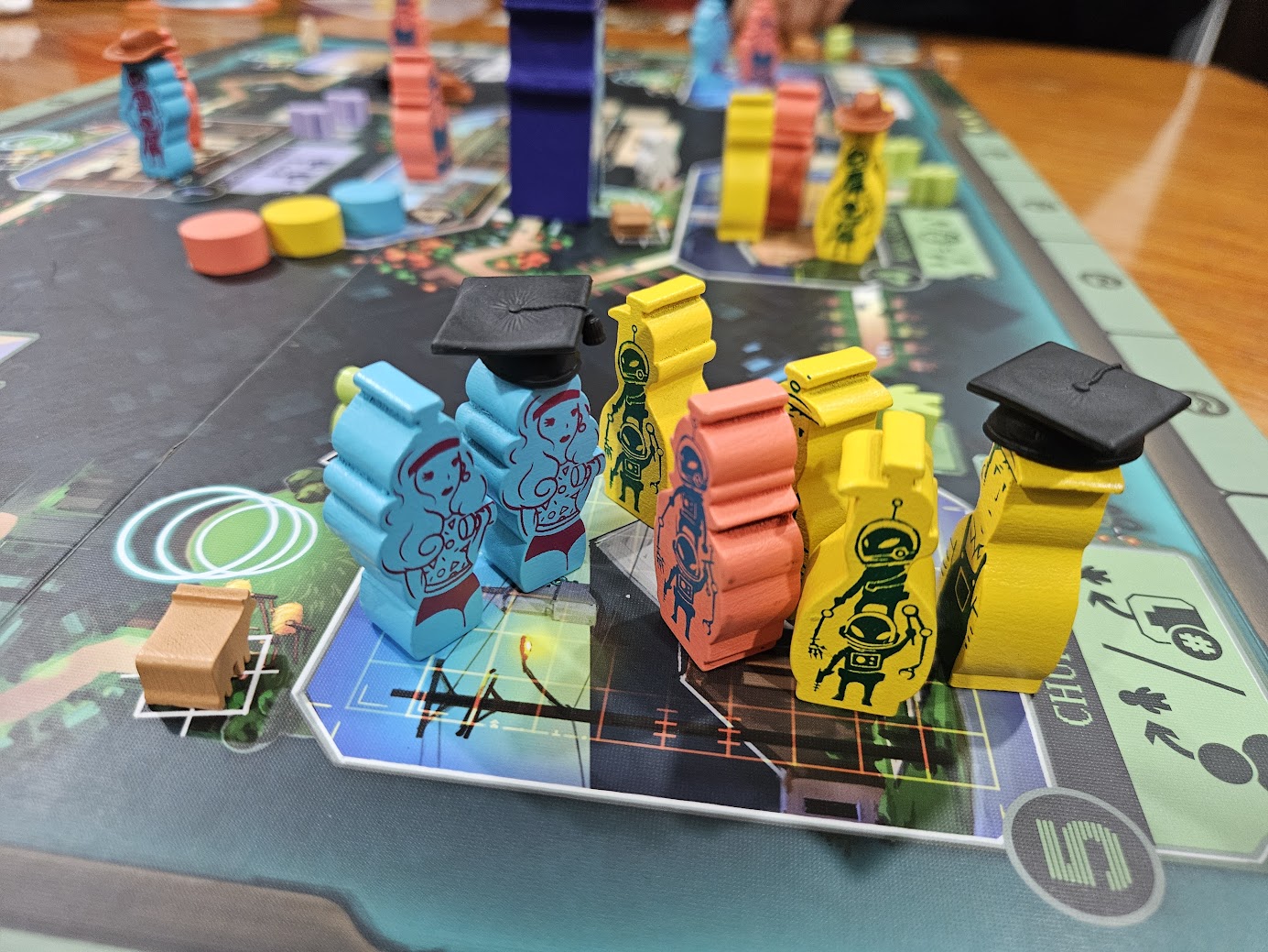 Gameplay photo of the board game SILOS featuring various components and board state.