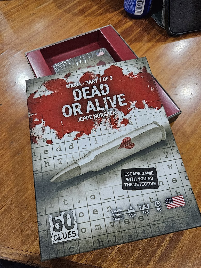 Gameplay photo of the board game 50 Clues: Dead or Alive featuring various components and board state.
