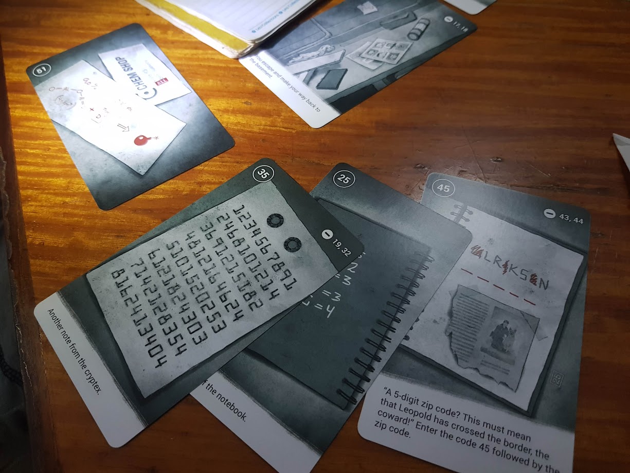 Gameplay photo of the board game 50 Clues: The Fate of Leopold featuring various components and board state.