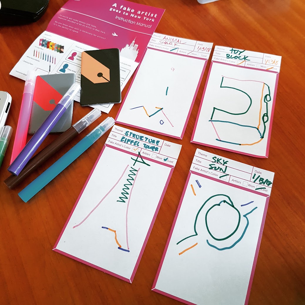 Gameplay photo of the board game A Fake Artist Goes to New York featuring various components and board state.