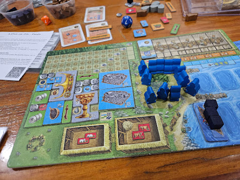 Gameplay photo of the board game A Feast for Odin featuring various components and board state.