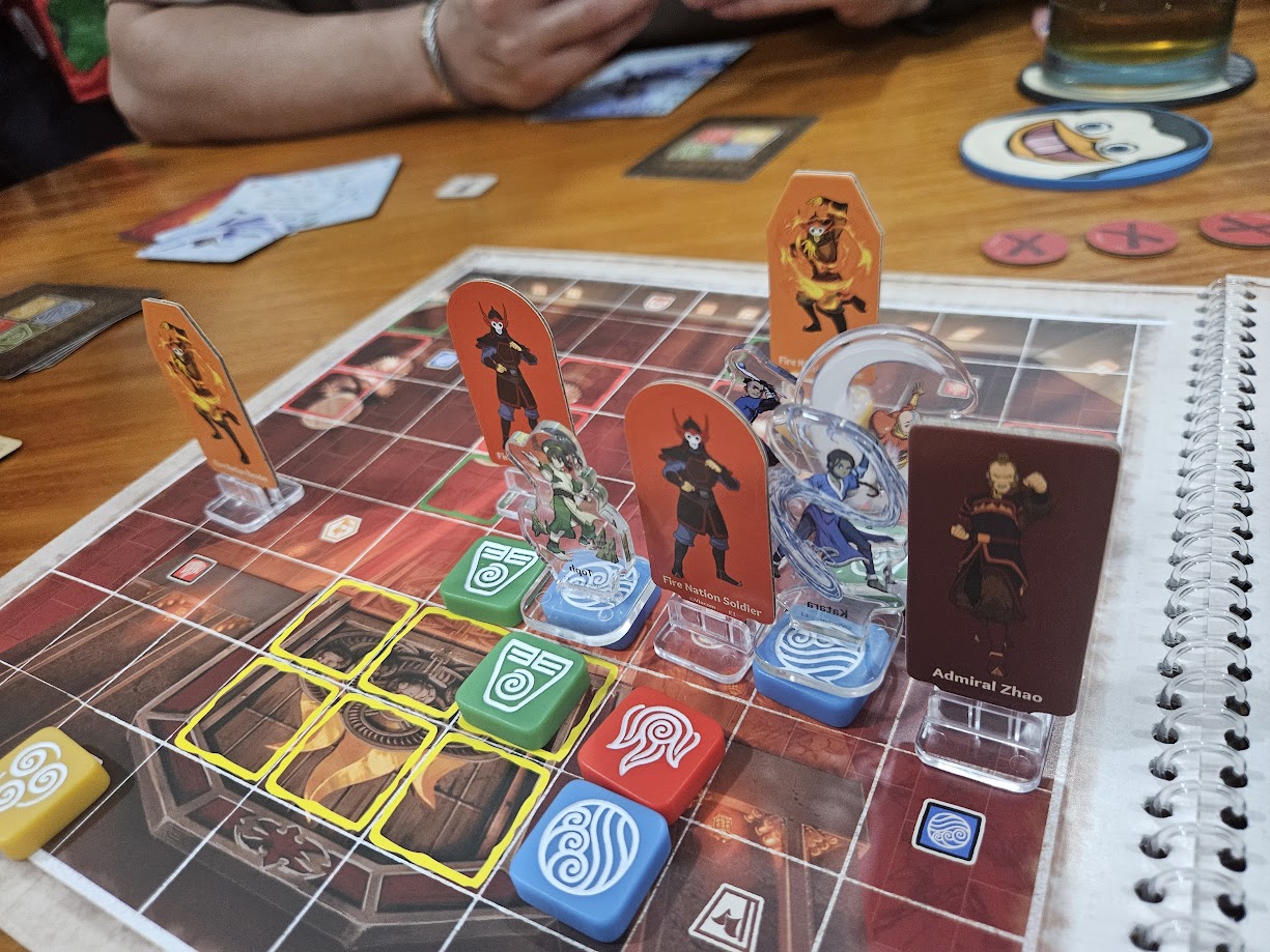 Gameplay photo of the board game Avatar: The Last Airbender – Crossroads of Destiny featuring various components and board state.