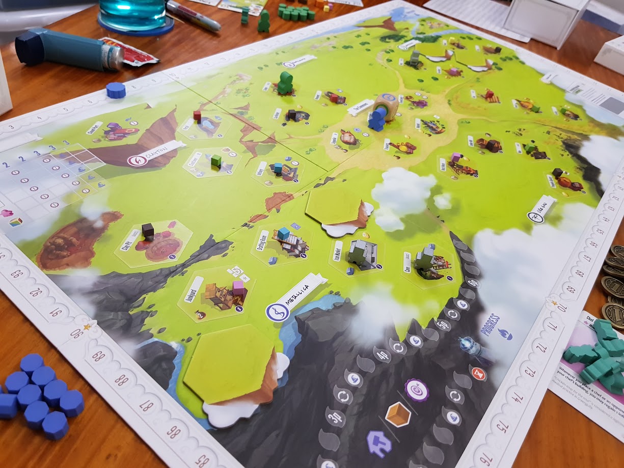 Gameplay photo of the board game Charterstone featuring various components and board state.