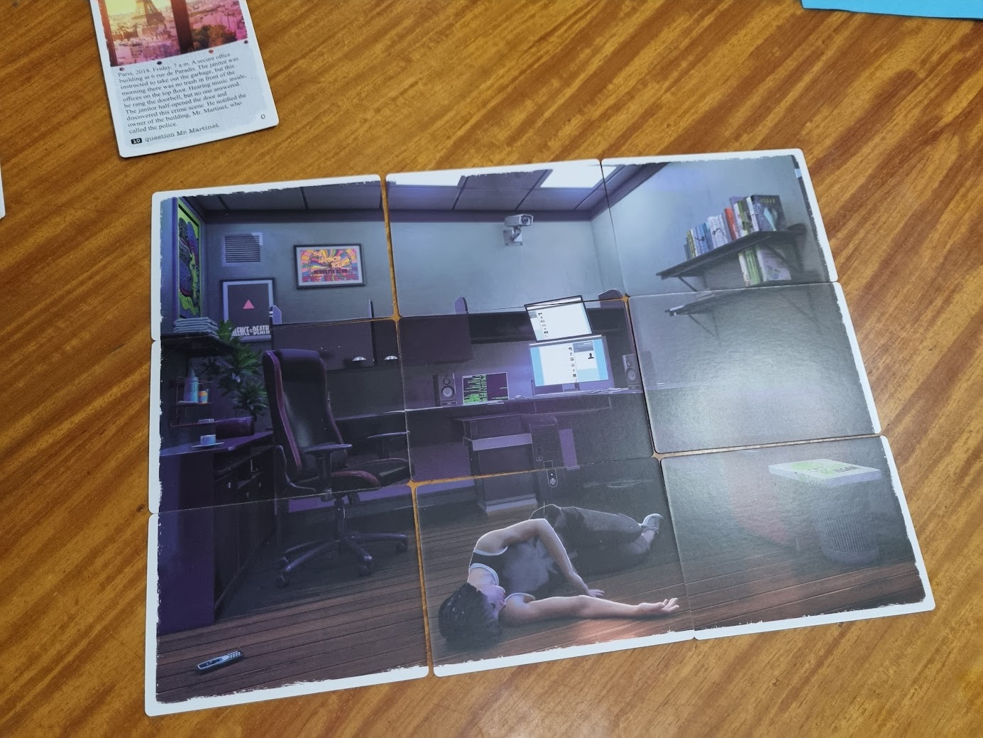 Gameplay photo of the board game Crime Zoom: Bird of Ill Omen featuring various components and board state.