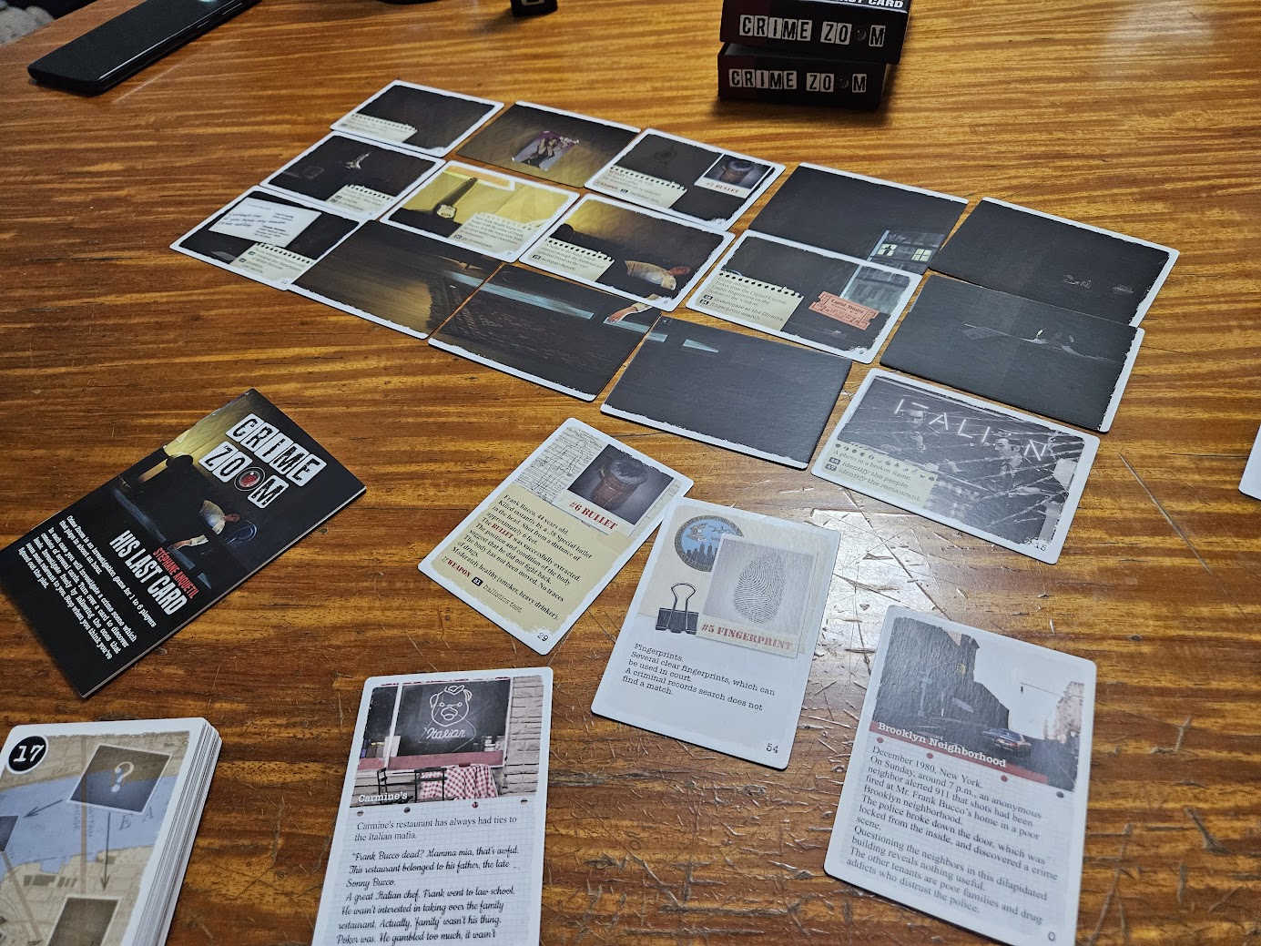 Gameplay photo of the board game Crime Zoom: His Last Card featuring various components and board state.