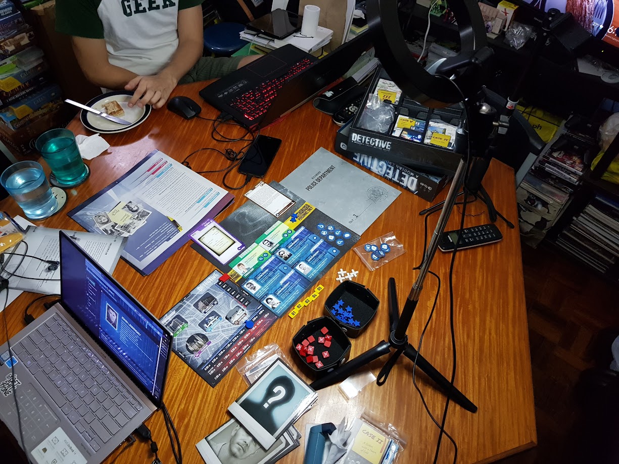 Gameplay photo of the board game Detective: A Modern Crime Board Game featuring various components and board state.