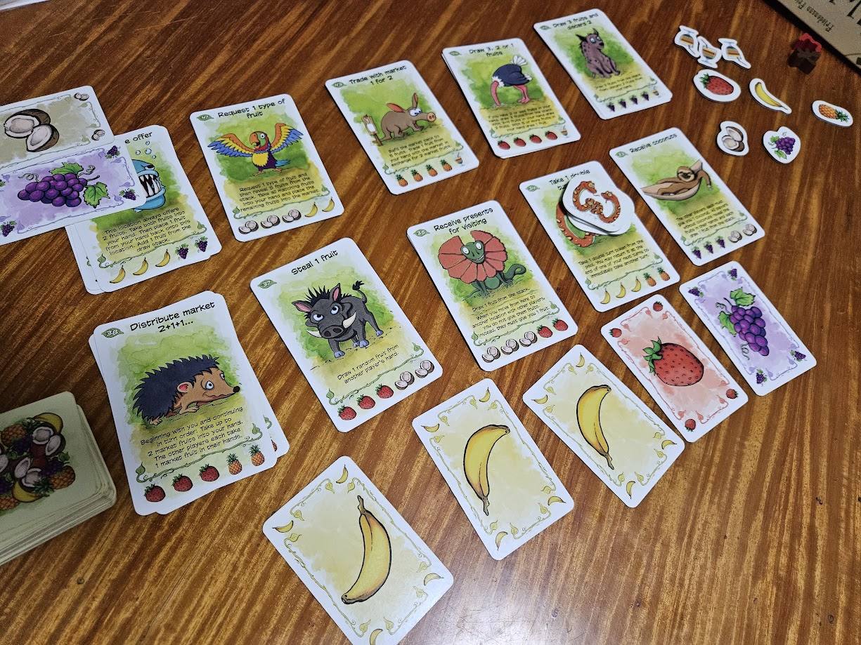 Gameplay photo of the board game Fabled Fruit featuring various components and board state.