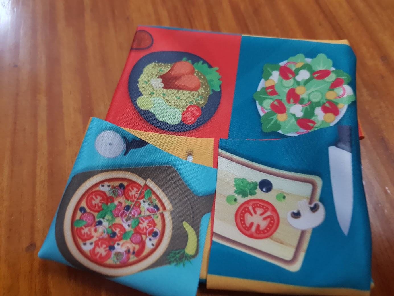 Gameplay photo of the board game Fold-it featuring various components and board state.