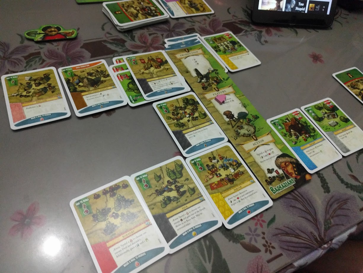 Gameplay photo of the board game Imperial Settlers: Why Can't We Be Friends featuring various components and board state.