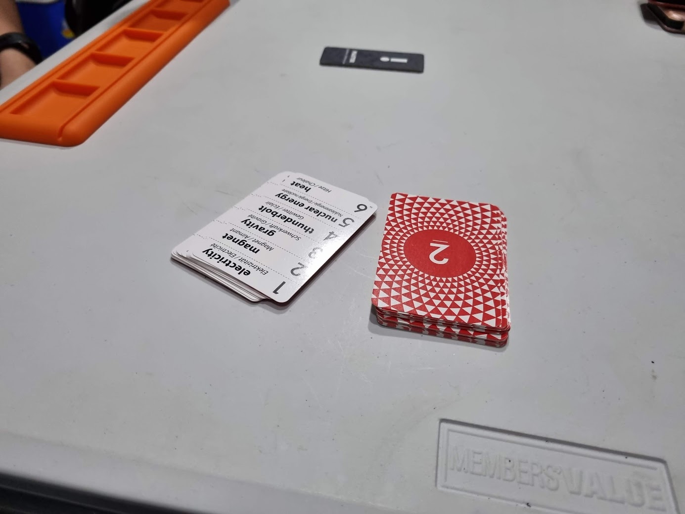 Gameplay photo of the board game Insider featuring various components and board state.