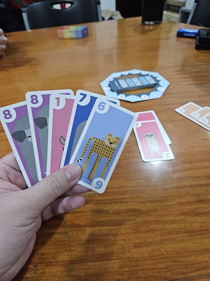 Gameplay photo of the board game Kariba featuring various components and board state.