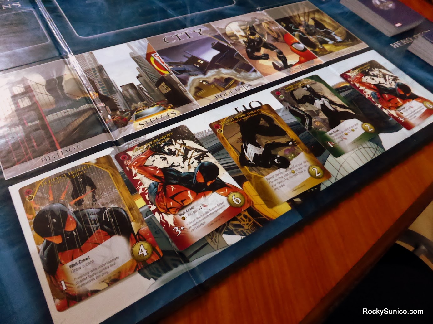 Gameplay photo of the board game Legendary: A Marvel Deck Building Game – Paint the Town Red featuring various components and board state.