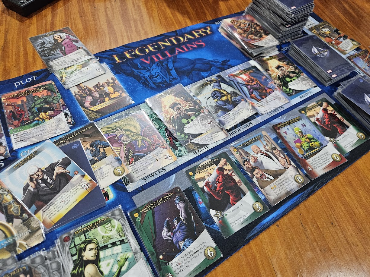 Gameplay photo of the board game Legendary: A Marvel Deck Building Game – Villains featuring various components and board state.