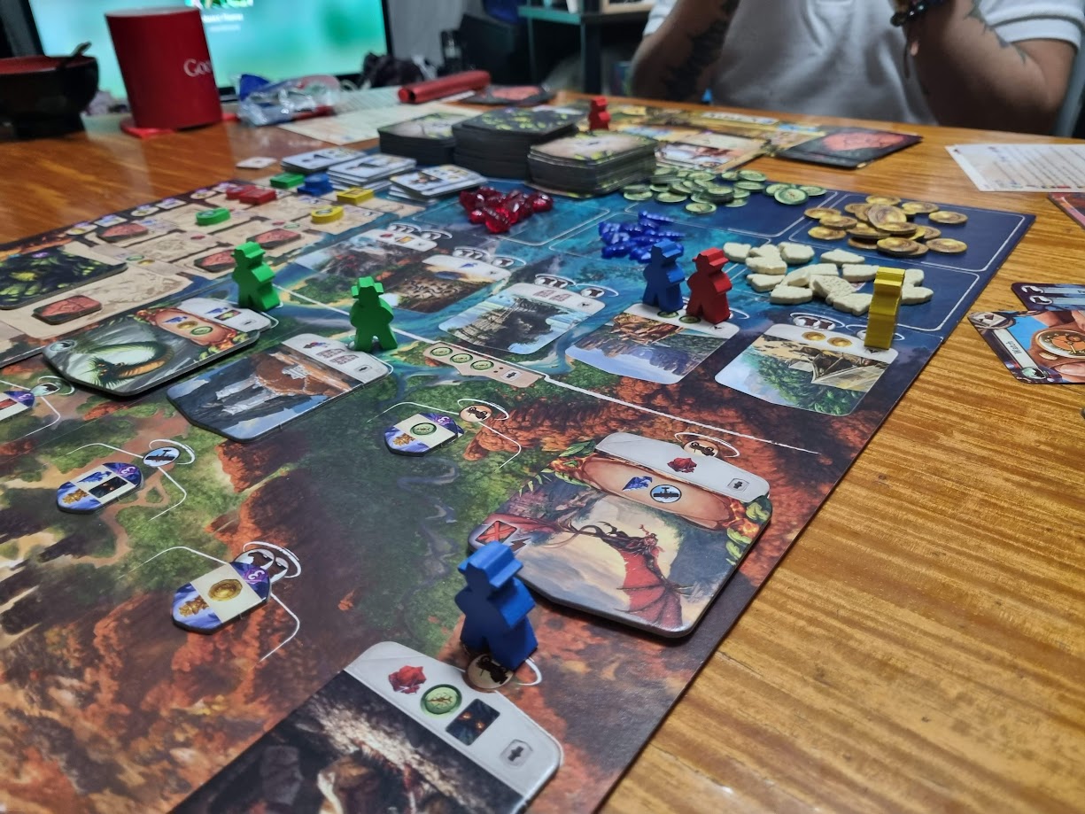 Gameplay photo of the board game Lost Ruins of Arnak featuring various components and board state.
