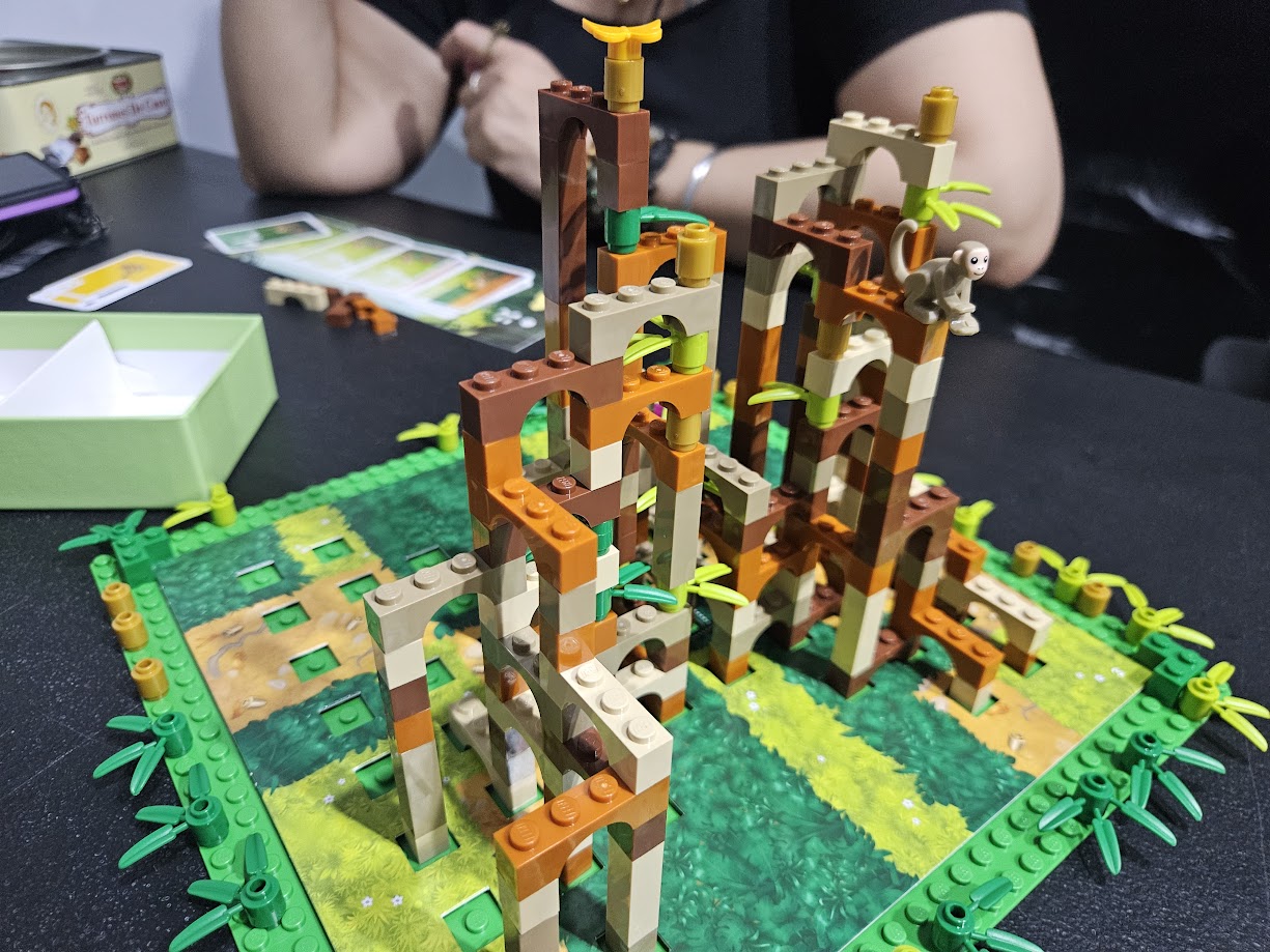 Gameplay photo of the board game Monkey Palace featuring various components and board state.
