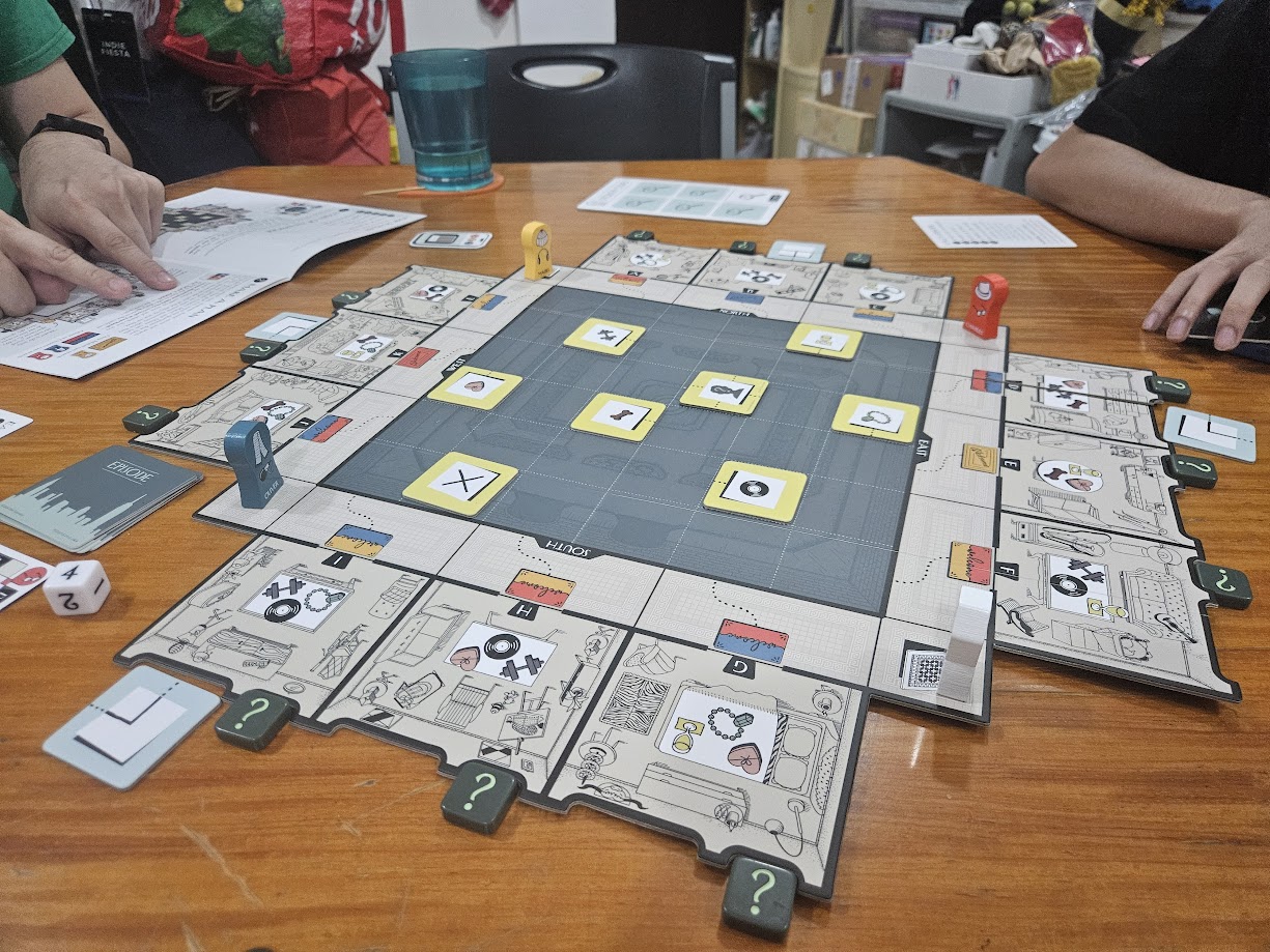 Gameplay photo of the board game Only Murders in the Building: The Game featuring various components and board state.