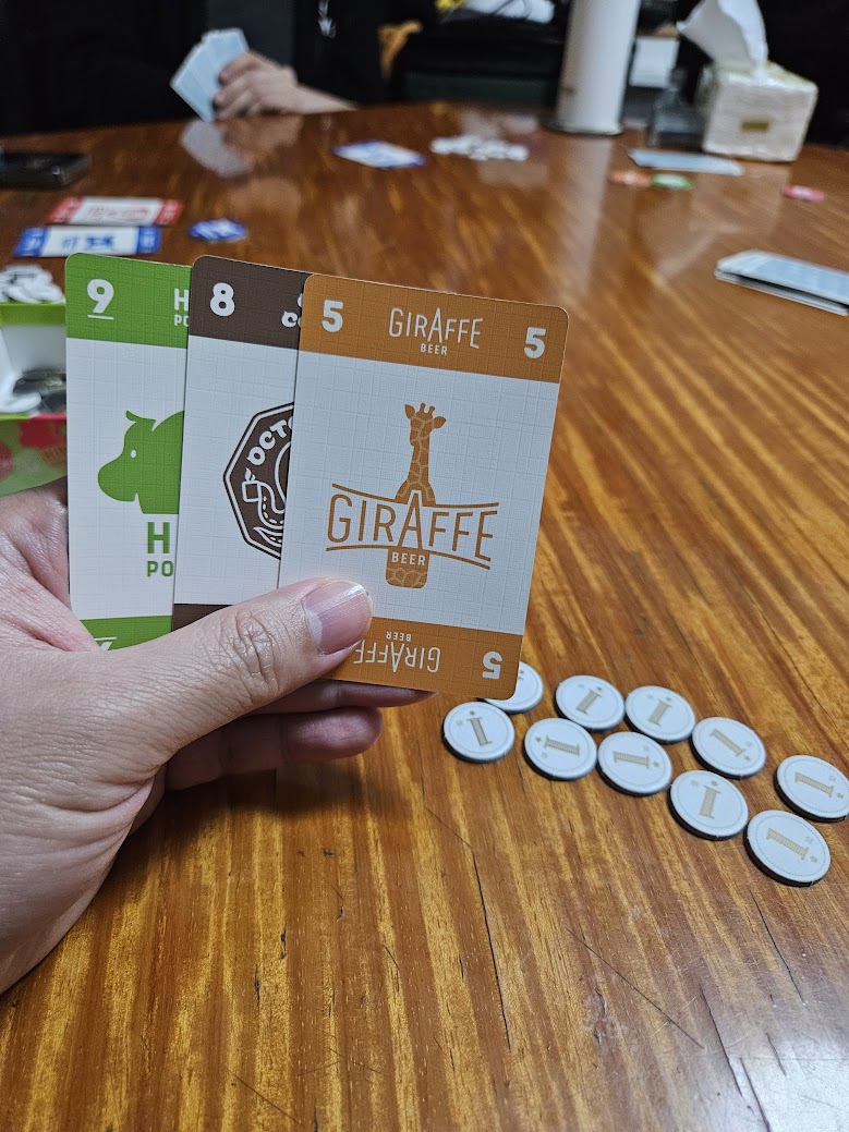 Gameplay photo of the board game Startups featuring various components and board state.