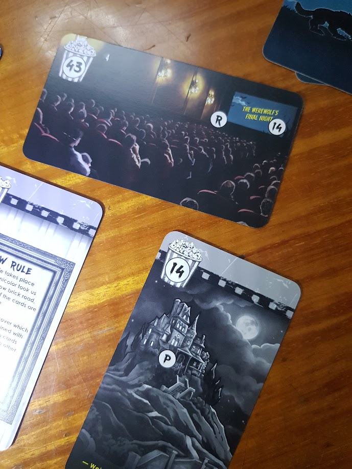 Gameplay photo of the board game Unlock!: Epic Adventures featuring various components and board state.