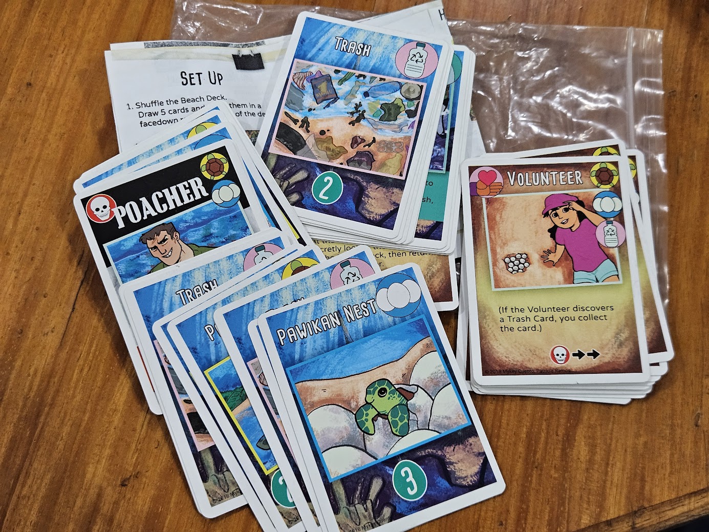 Gameplay photo of the board game Pawikan Patrol featuring various components and board state.