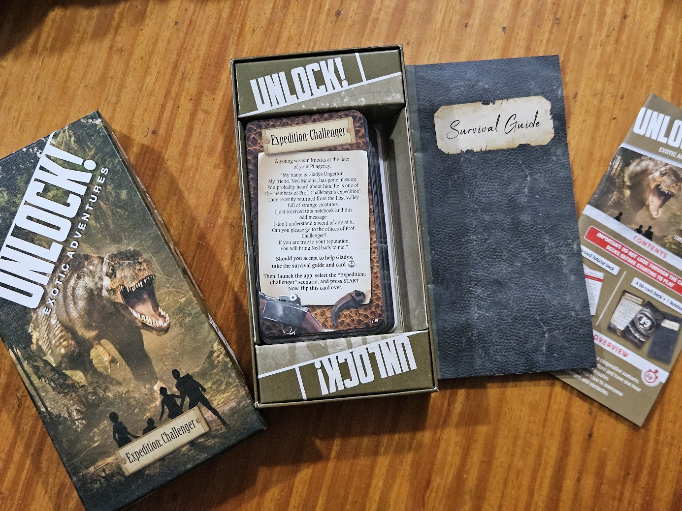 Gameplay photo of the board game Unlock!: Exotic Adventures – Expedition: Challenger featuring various components and board state.