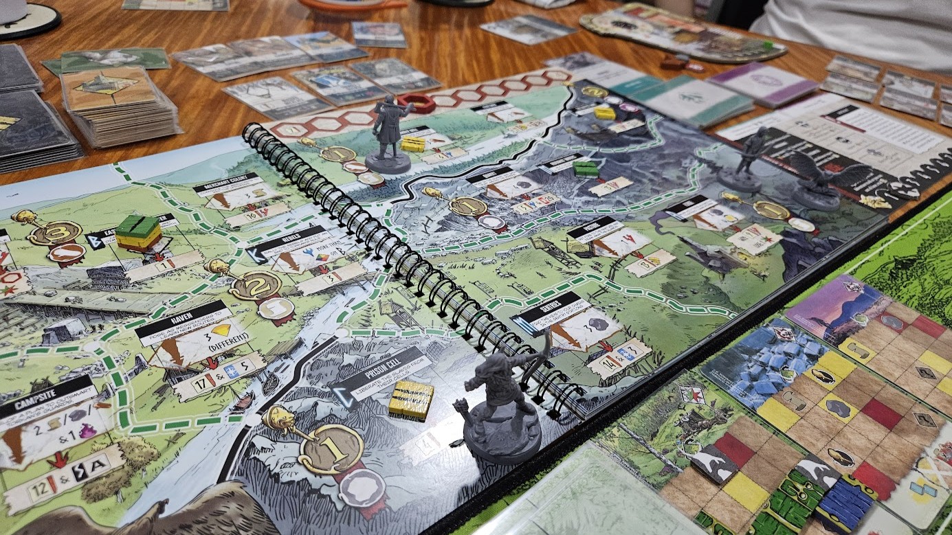 Gameplay photo of the board game Thorgal: The Board Game featuring various components and board state.