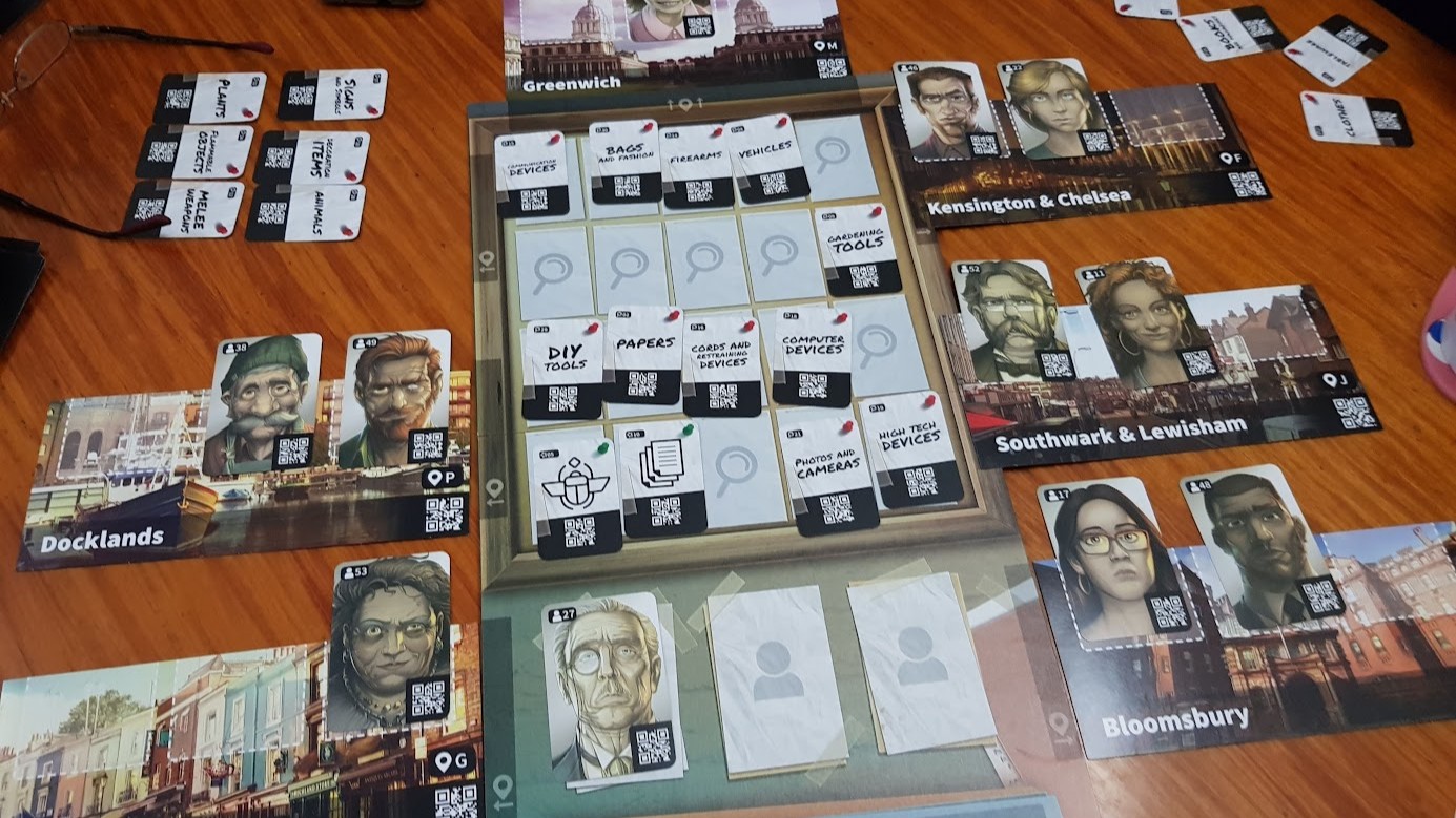 Gameplay photo of the board game Chronicles of Crime featuring various components and board state.