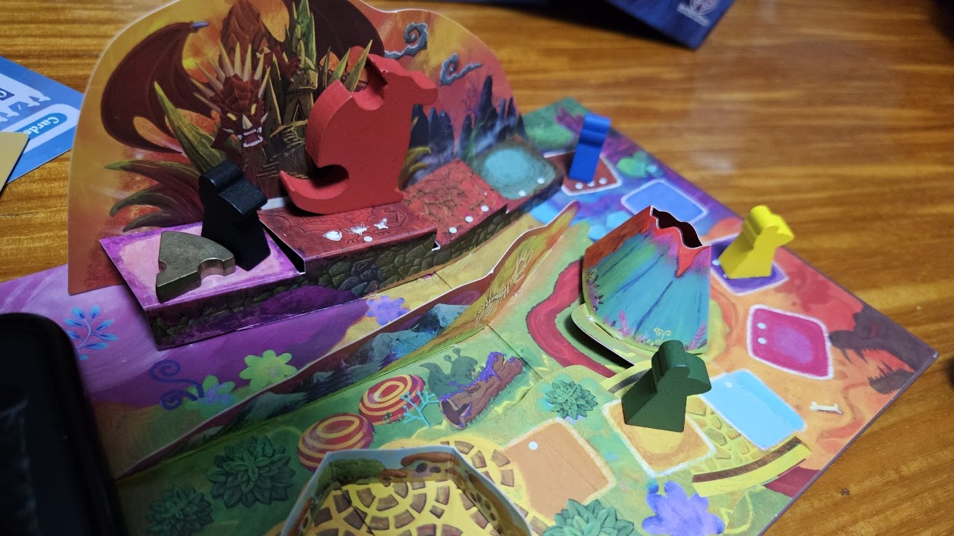 Gameplay photo of the board game Mythe featuring various components and board state.