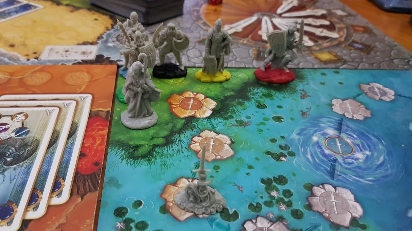 Gameplay photo of the board game Shadows over Camelot: Merlin's Company featuring various components and board state.