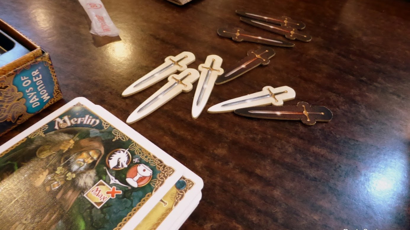 Gameplay photo of the board game Shadows over Camelot: The Card Game featuring various components and board state.