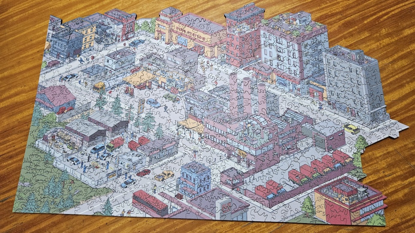 Gameplay photo of the board game Quatro City featuring various components and board state.