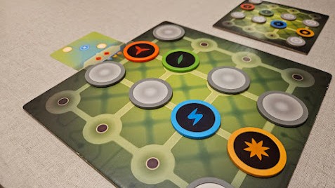 Gameplay photo of the board game Switch ON! featuring various components and board state.