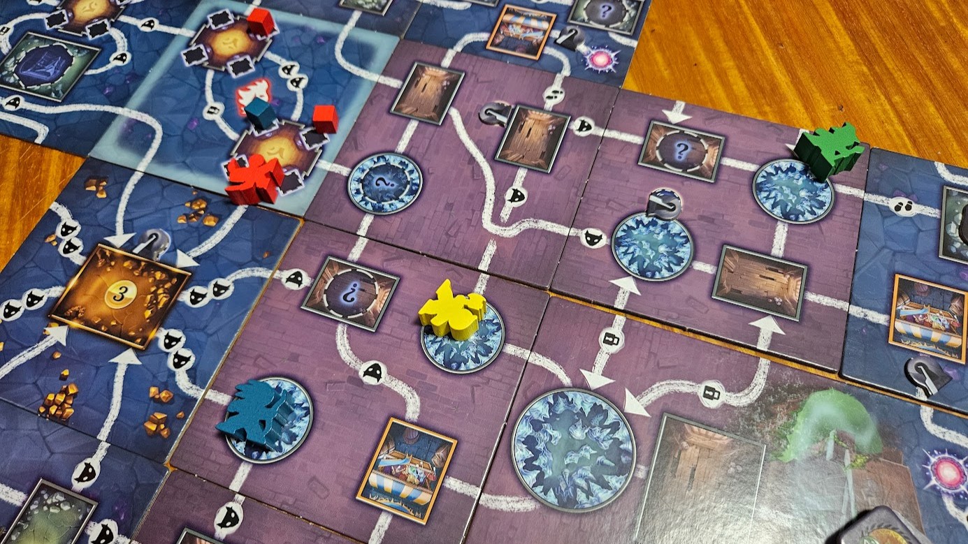 Gameplay photo of the board game Clank!: Catacombs featuring various components and board state.