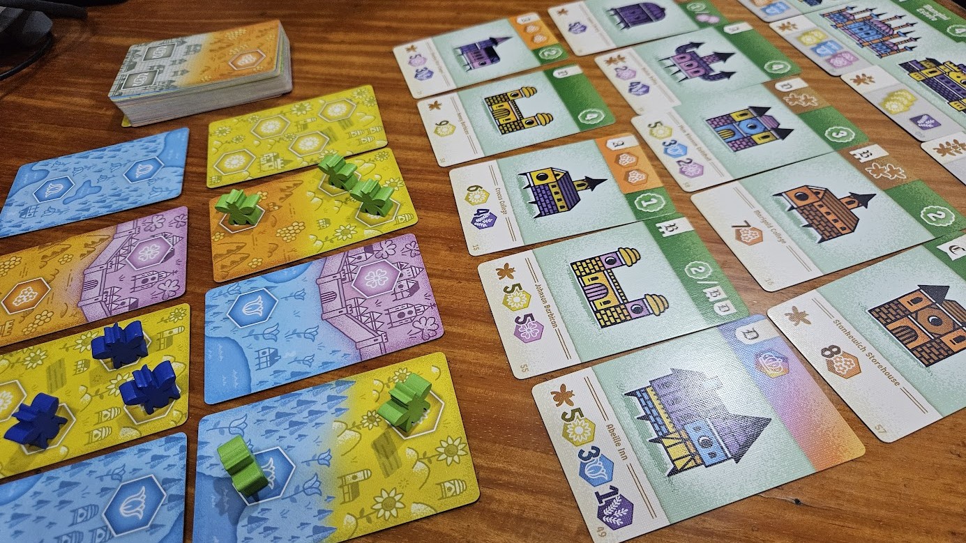 Gameplay photo of the board game Propolis featuring various components and board state.