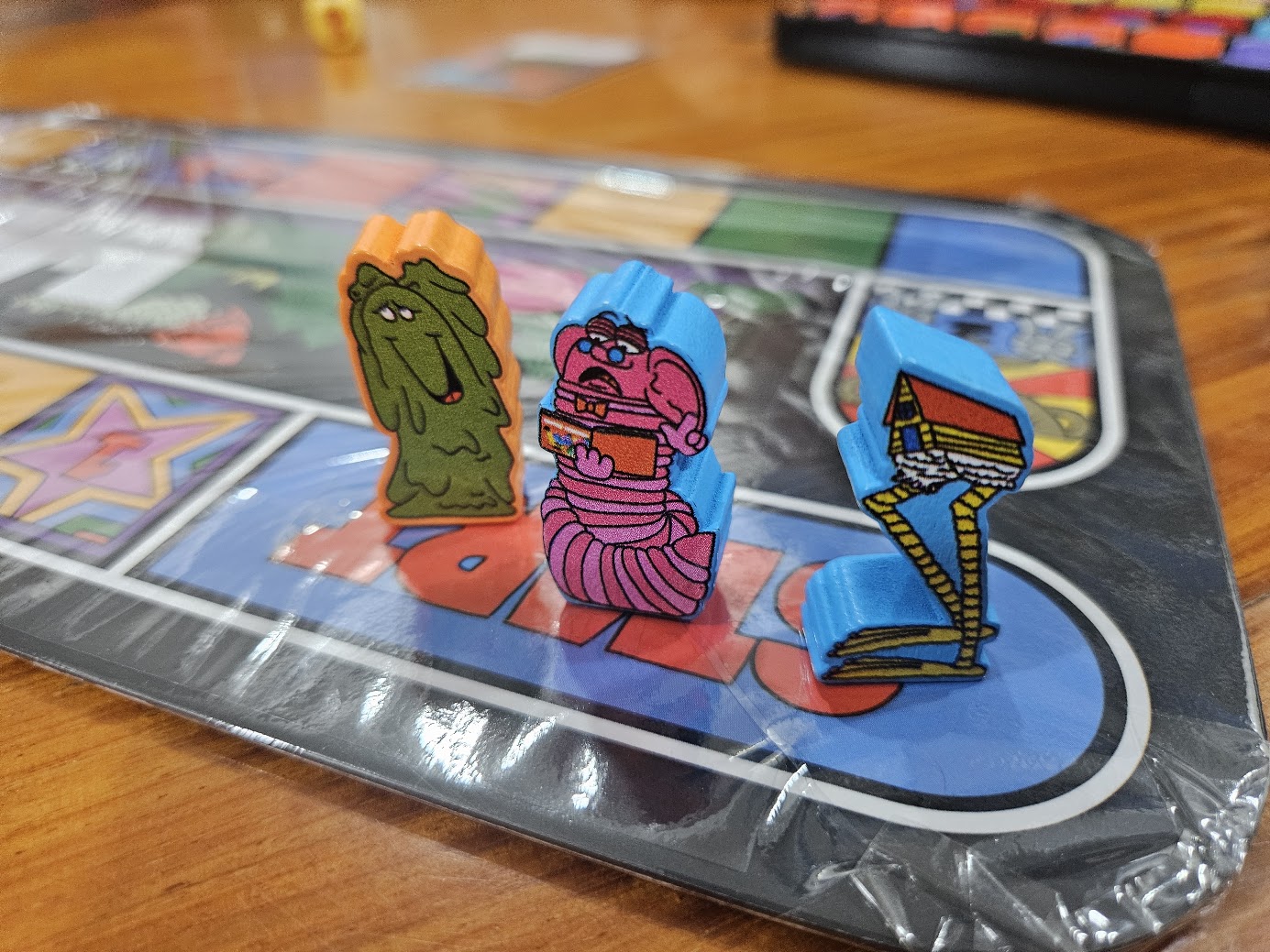 Gameplay photo of the board game Magical Athlete featuring various components and board state.