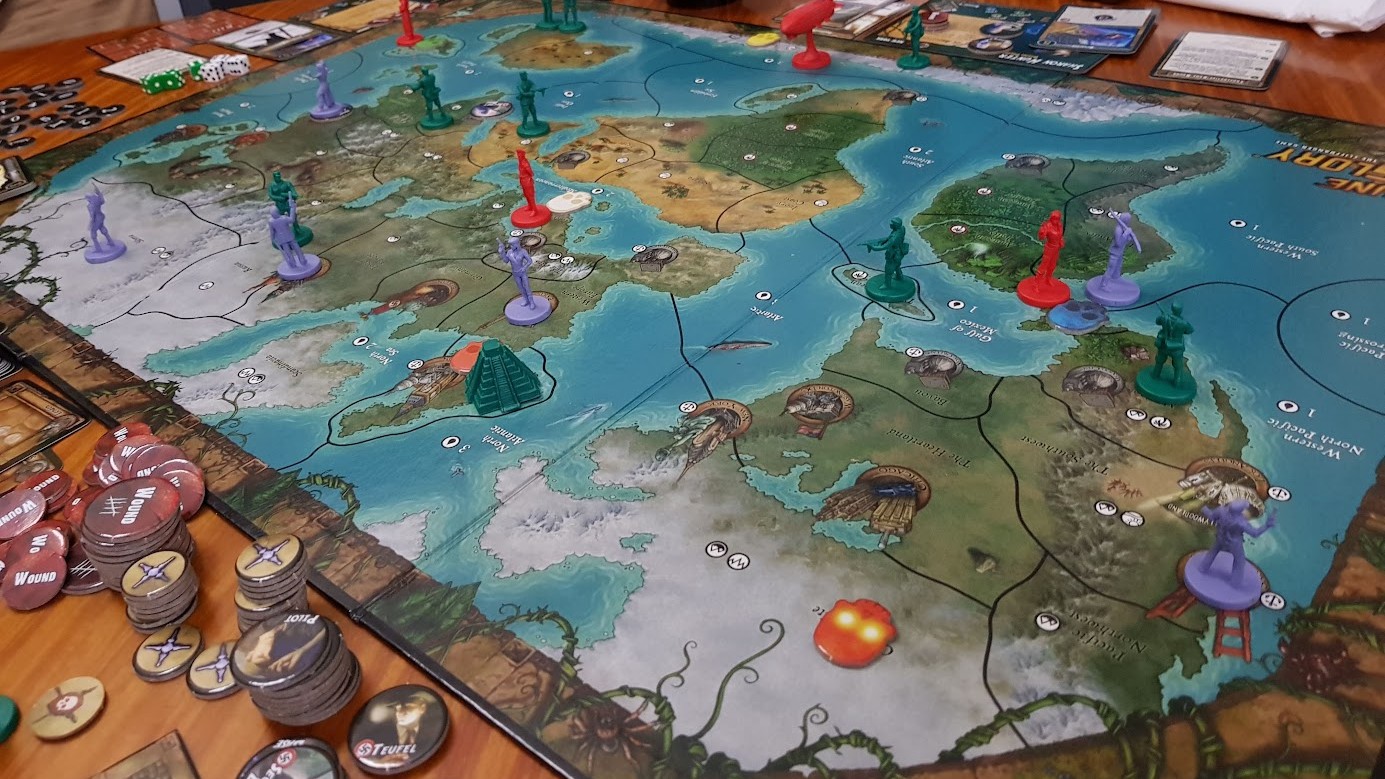 Gameplay photo of the board game Fortune and Glory: The Cliffhanger Game featuring various components and board state.