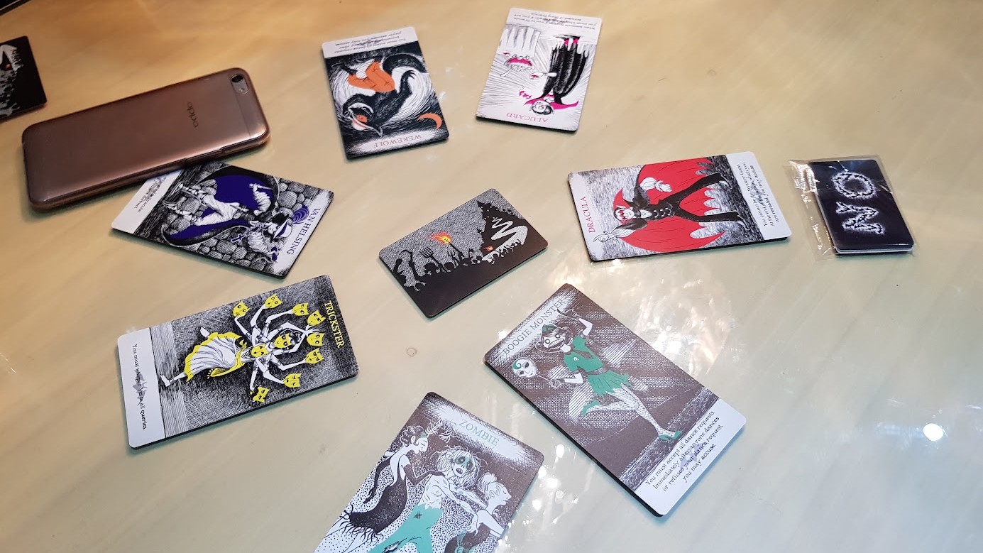 Gameplay photo of the board game Dracula's Feast featuring various components and board state.