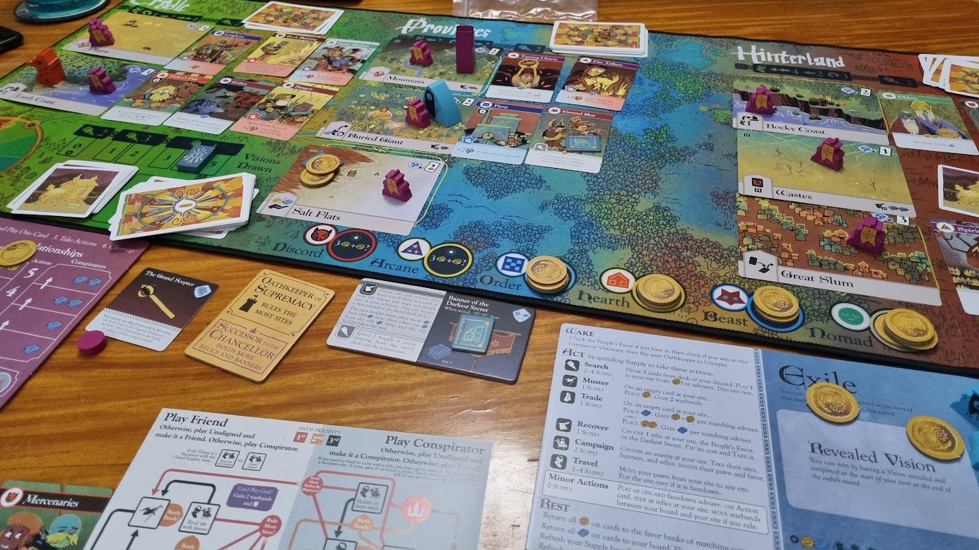 Gameplay photo of the board game Oath featuring various components and board state.