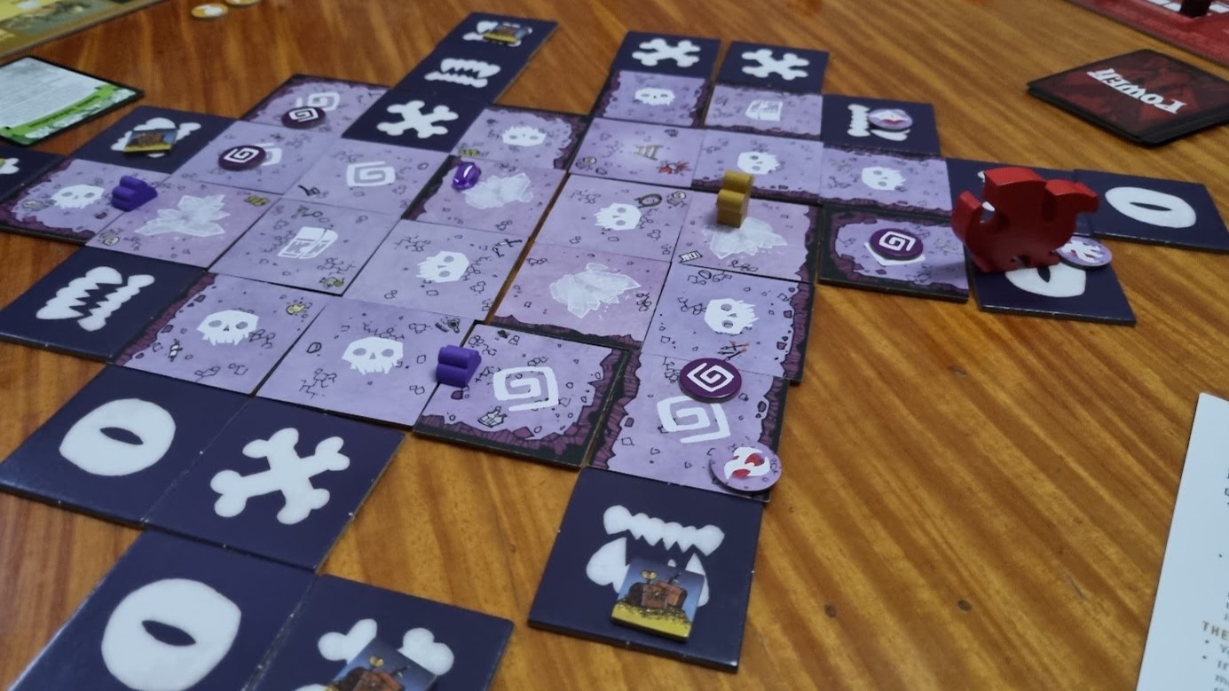 Gameplay photo of the board game Vast: The Crystal Caverns featuring various components and board state.