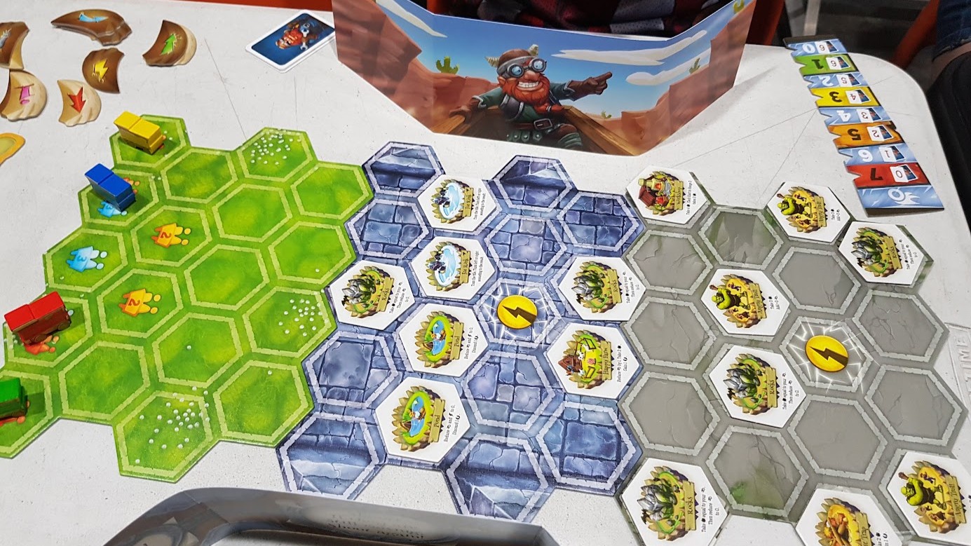 Gameplay photo of the board game Crazy Karts featuring various components and board state.