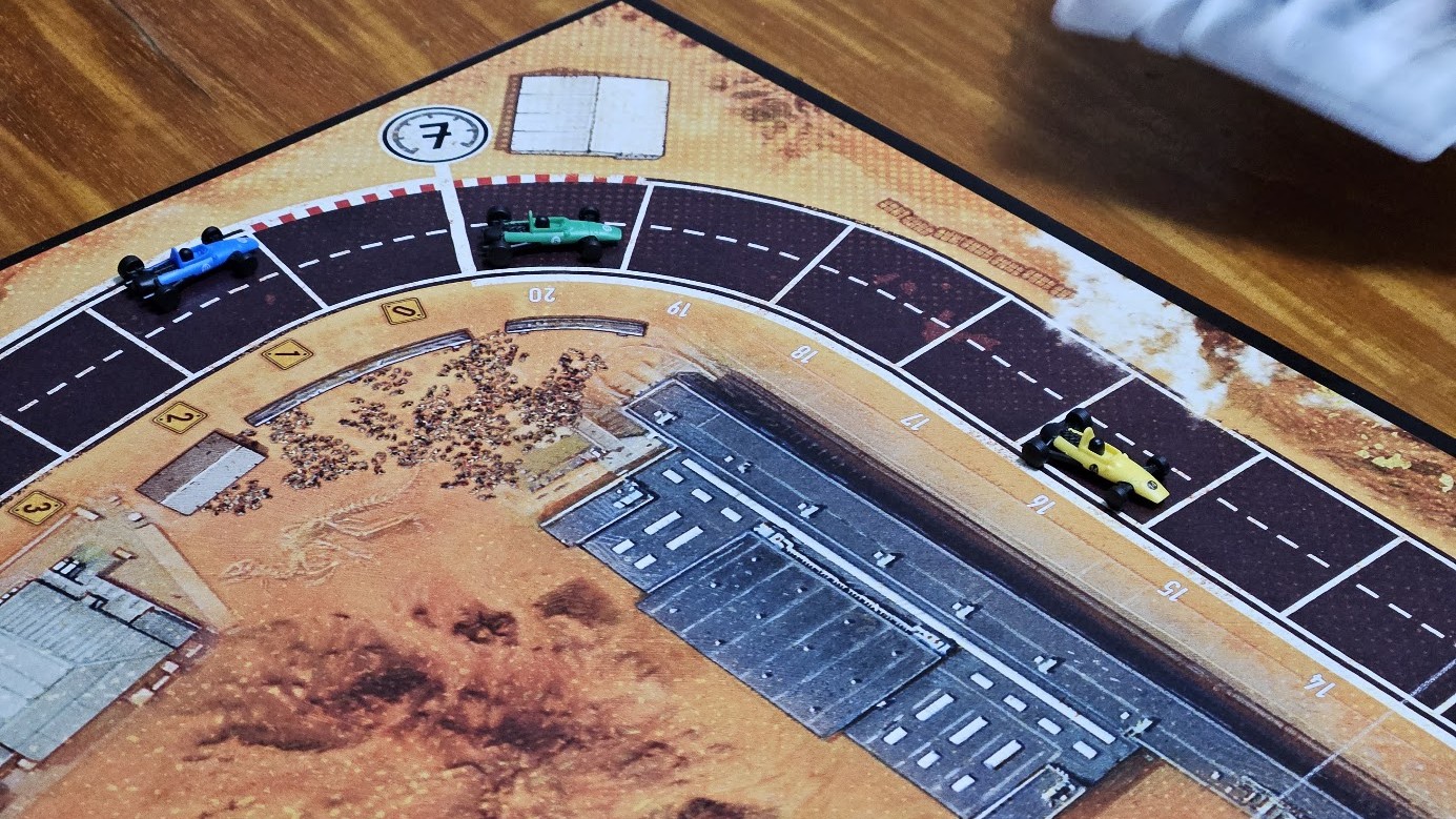 Gameplay photo of the board game Heat: Pedal to the Metal featuring various components and board state.