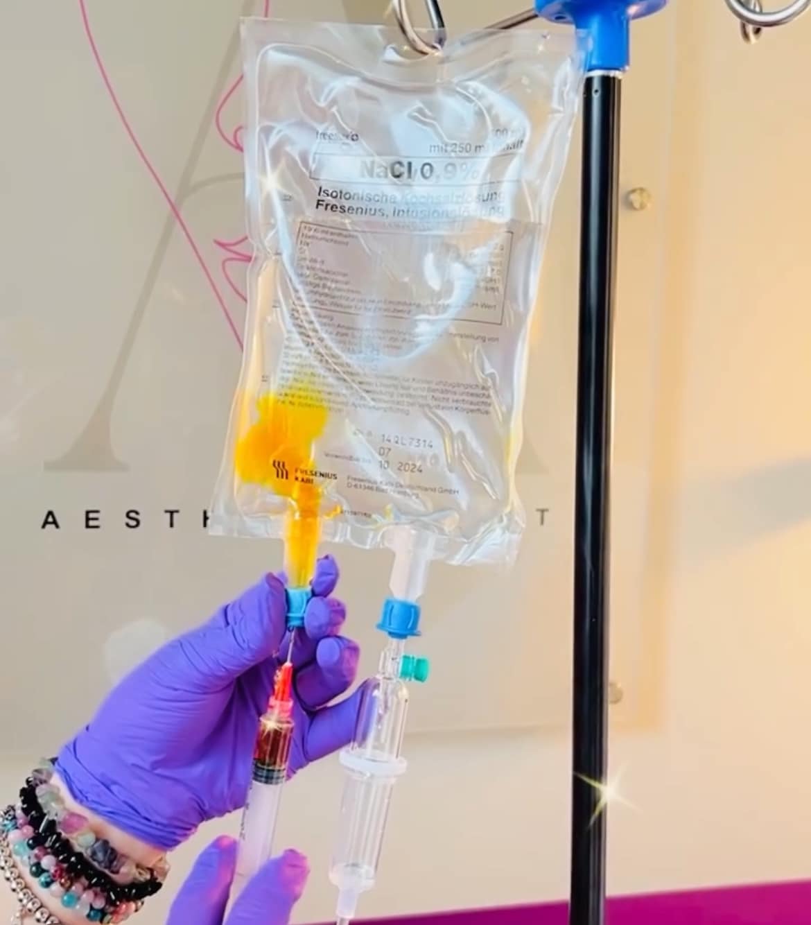 image of workers at machining station (for a manufacturing plant)