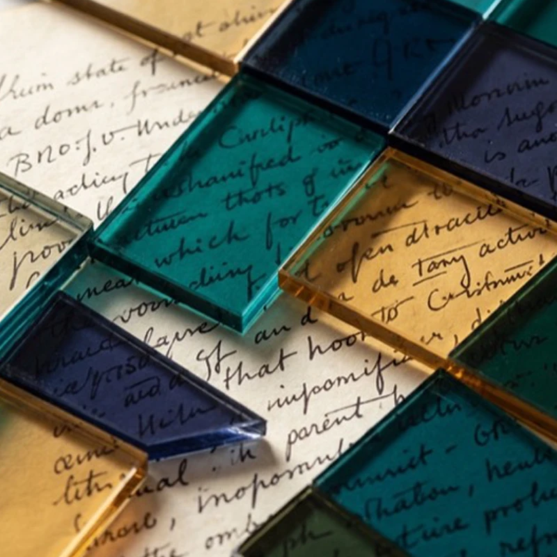 Coloured glass panels laid over handwritten legal documents, illustrating reform and modernisation of the law of wills.