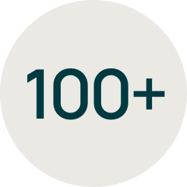 Circle with the text '100+' in dark teal on a light gray background.