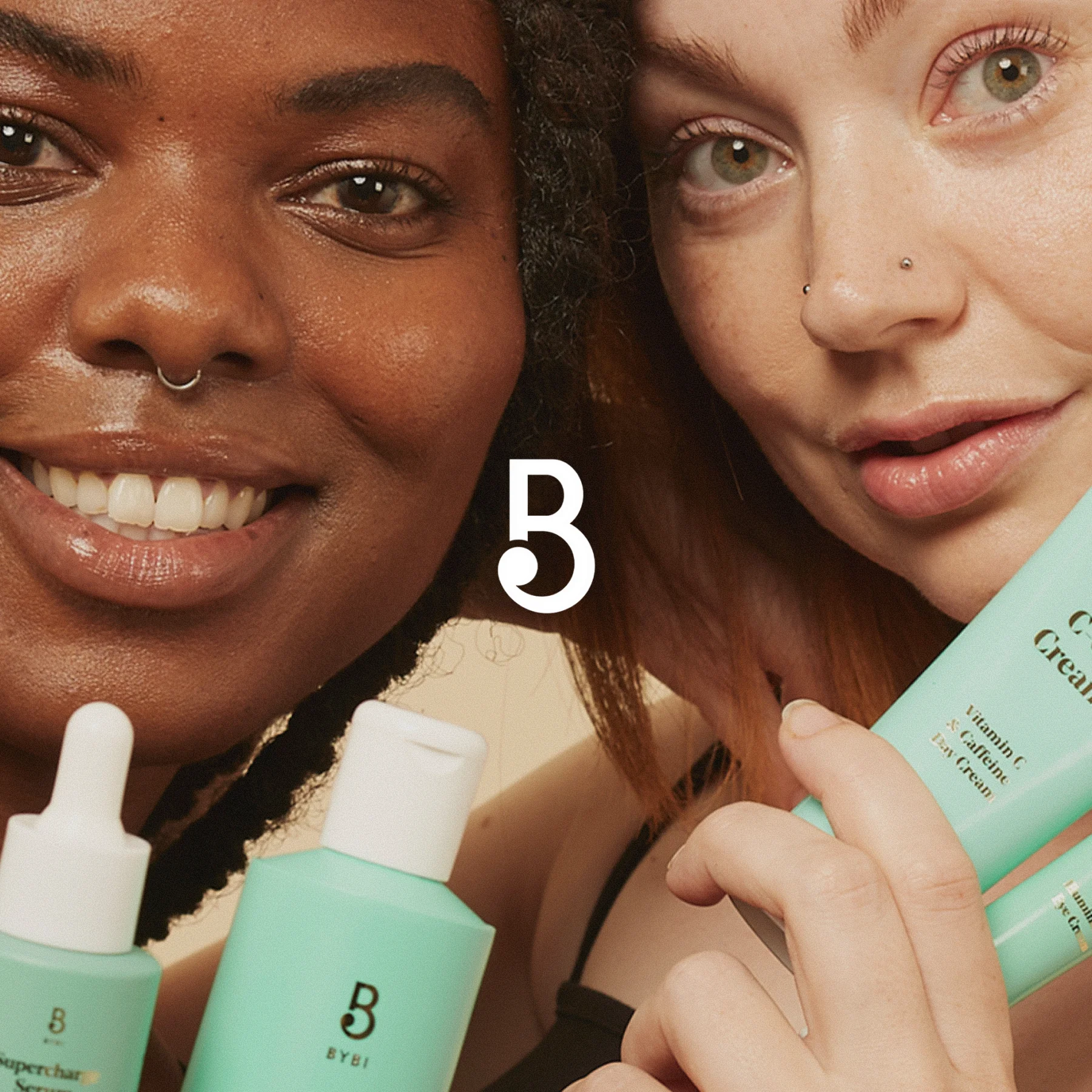 BYBI brand logo in centre of two people holding BYBI products