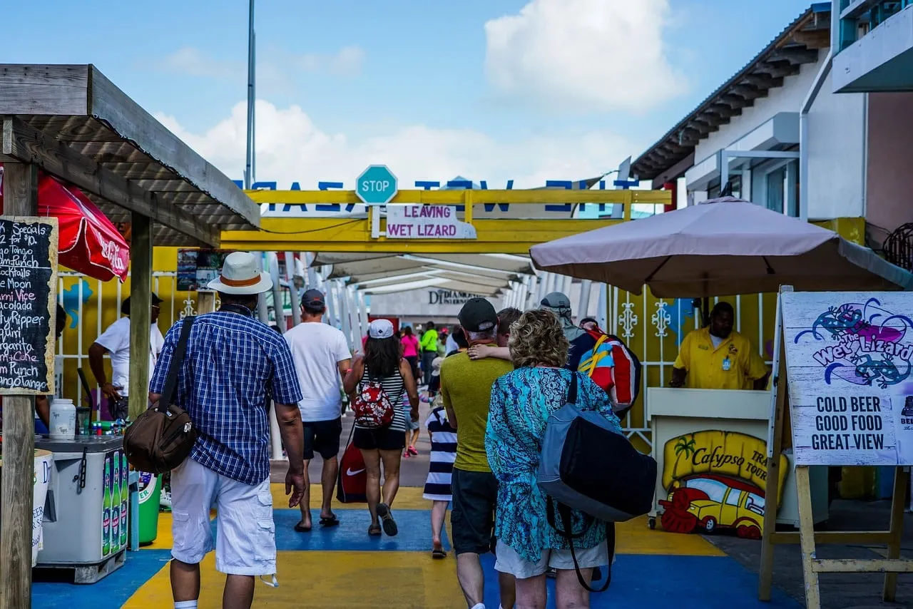 Travelers walking through San Pedro dock market area.