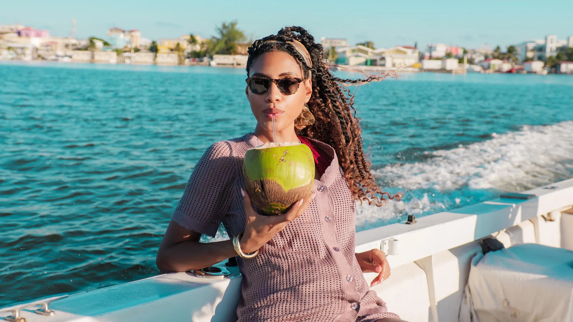 Fresh coconut and ocean breeze on the water.